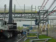 Final attachment of bridge to towers